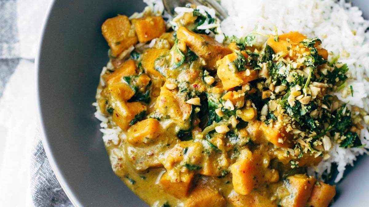 Sweet Potato Curry in a bowl with rice.
