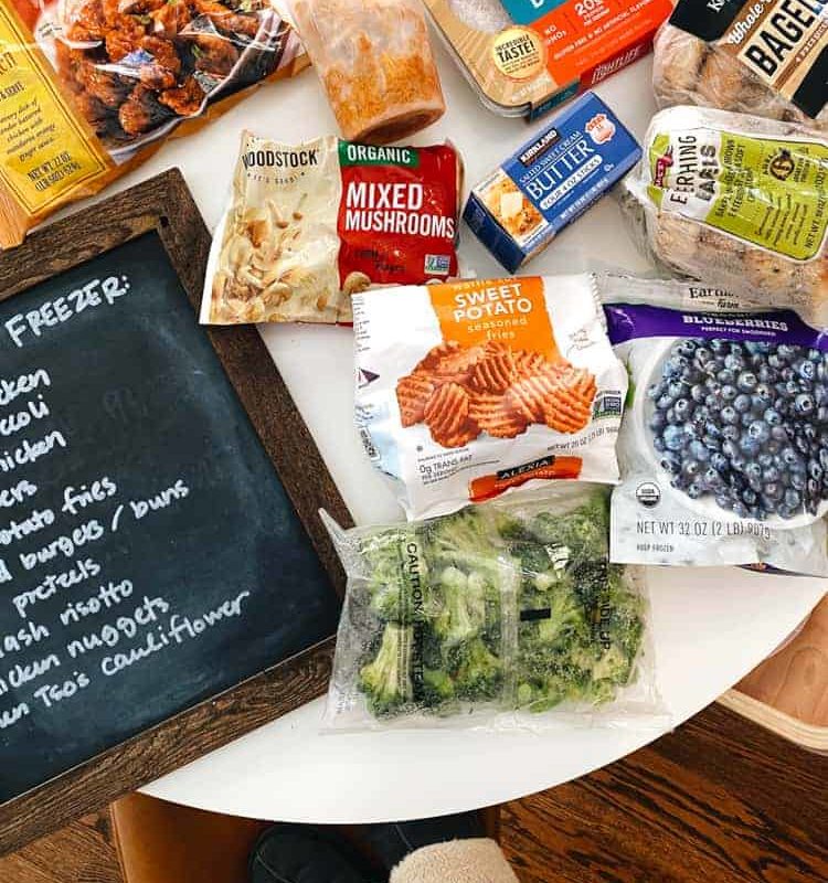 Bags of foods on a white table.