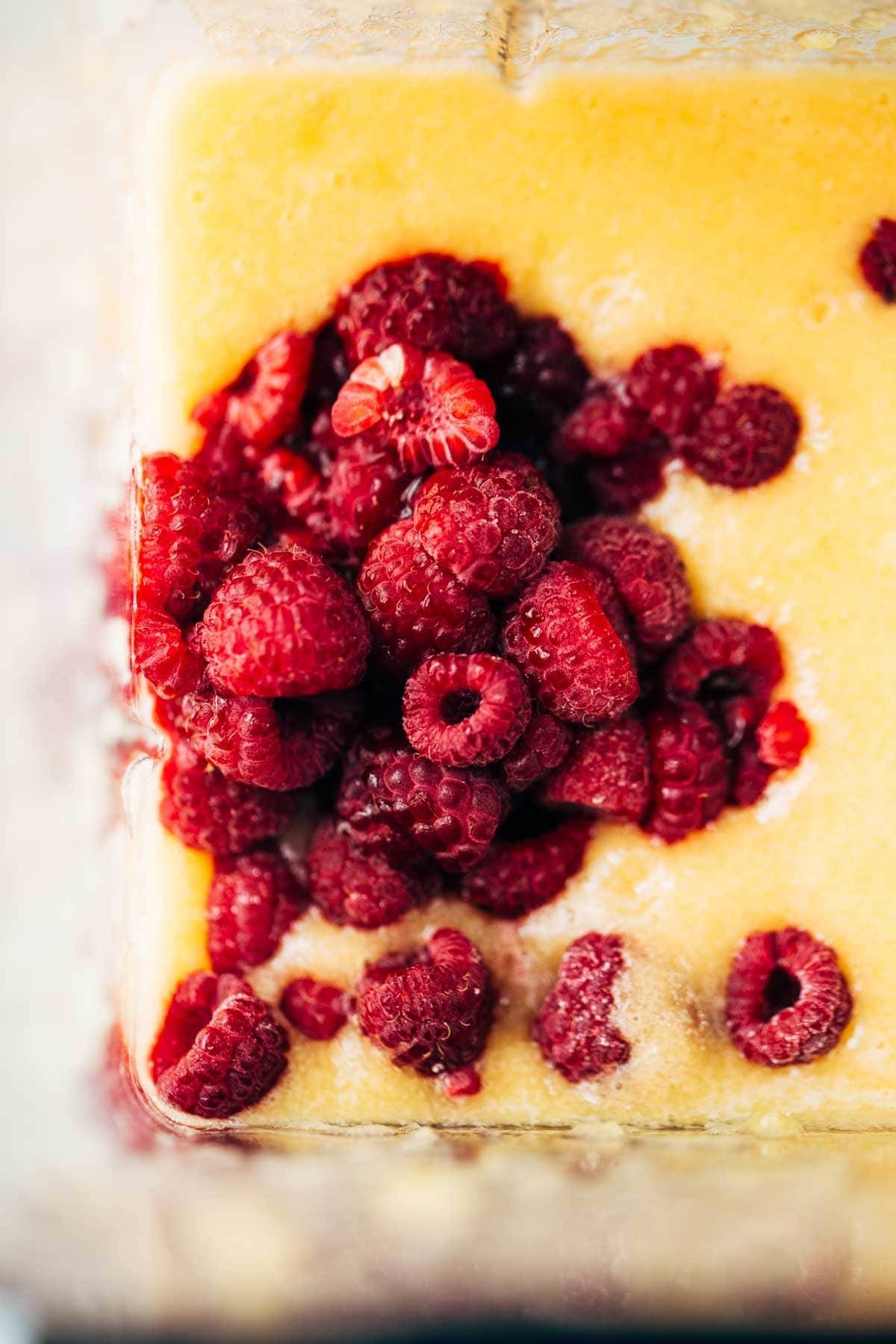 Raspberries in a blender.